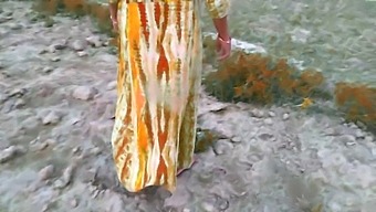 Young Indian Housewife And Husband Captured Outdoors In Homemade Video
